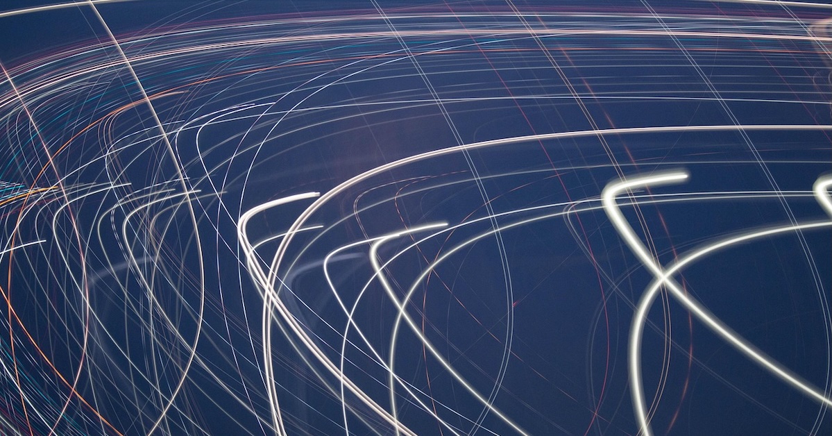 Image of light and speed to represent sophisticated algorithmic trading and low-latency trading technology.